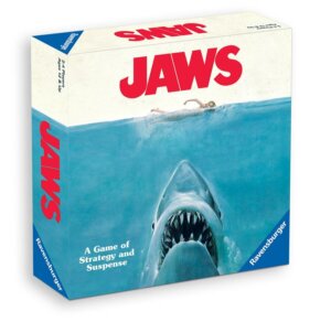 Jaws the board game by Ravensburger, cover art with giant shark approaching a swimmer from below