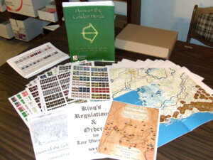 heirs of the golden horde wargame maps, counters, and rules spread out on a wooden table