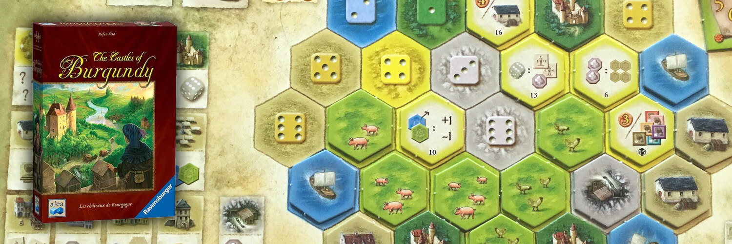 new classic board games castles of burgundy game box set on top of a player board with tiles on it