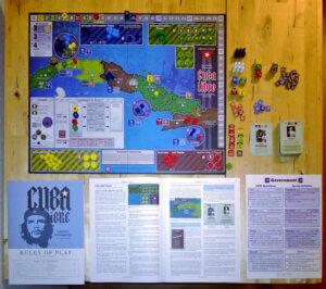 game components for the GMT Games war game Cuba Libre spread out on a wooden table