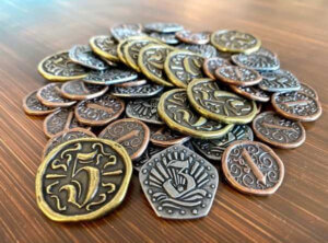 pile of doubloon-style metal coins for the board game Libertalia